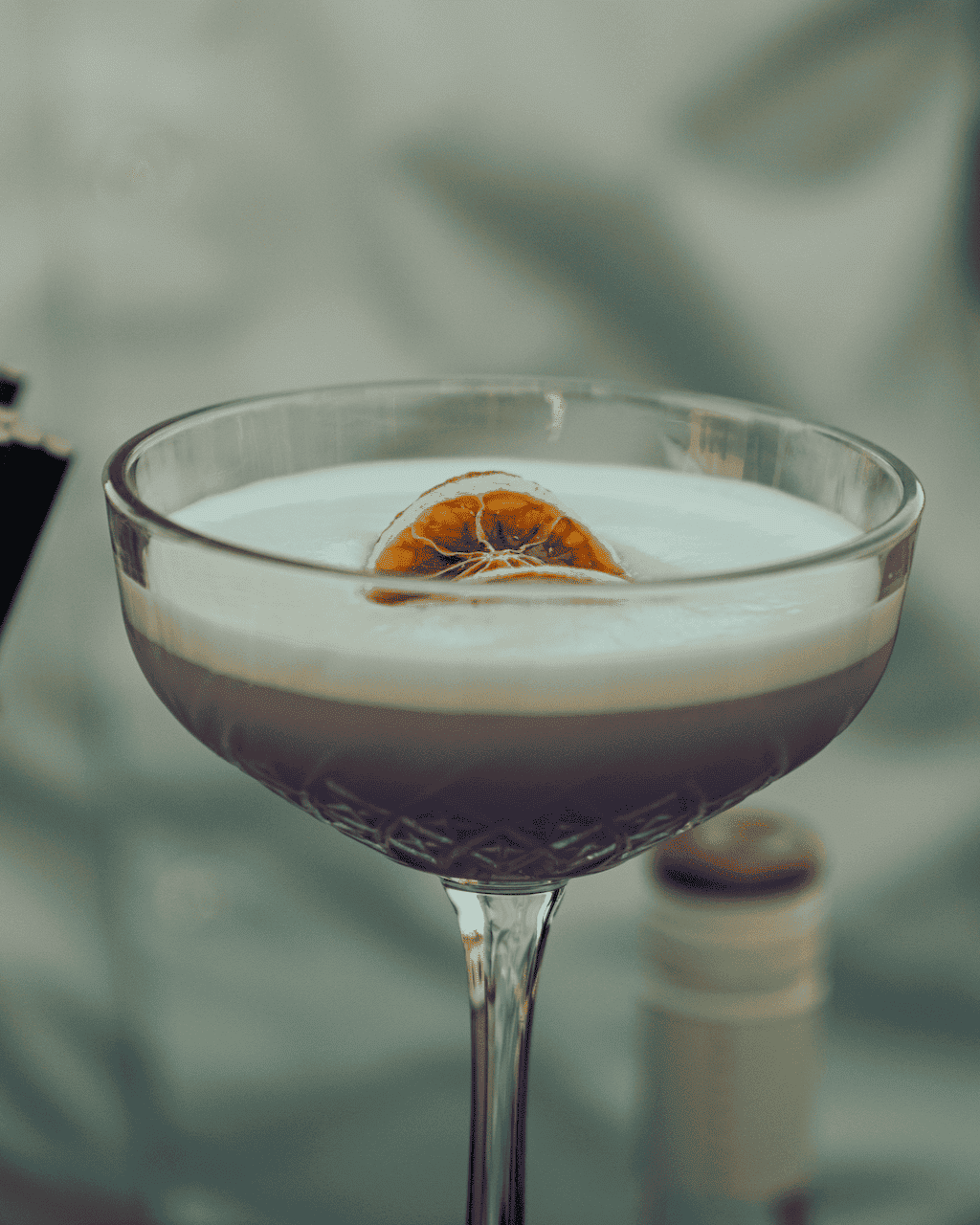 Purple cocktail by the rooftop pool at The Capital Boutique Valletta